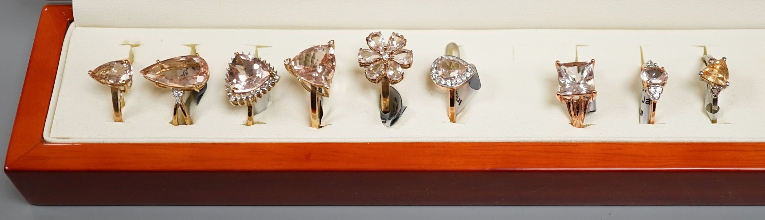 Eight assorted modern 9ct gold and morganite set dress rings and a 925 and gem set ring